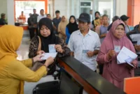 Ilustrasi Pencairan PKH dan BPNT (Foto: AI)