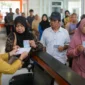 Ilustrasi Pencairan PKH dan BPNT (Foto: AI)