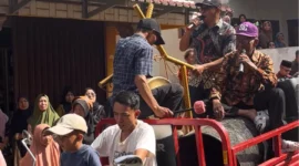 Nyerau dan Mendingin Negroi Sambut Kenduri Sko Lima Desa Tanjung Pauh Mudik (Foto: Desi Hermila)
